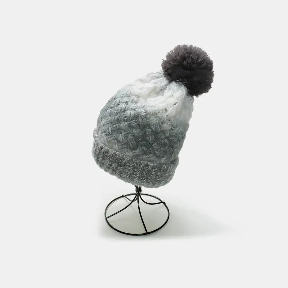 Chic gradient knit hat with pompom for luxury fashion enthusiasts $18.99 1-piece acrylic, polyester imported product