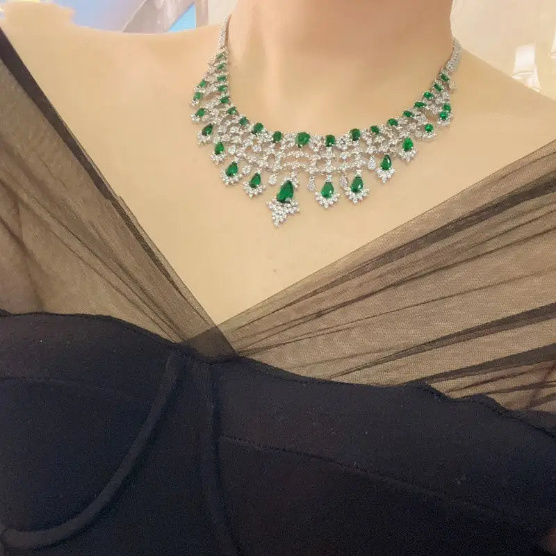 Elevate your style with the green waterdrops zircon jewelry set $109.99 product discover the epitome of elegance