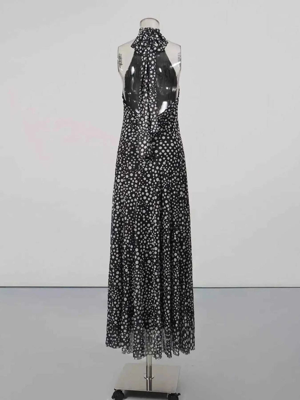Halter Neck Polka Dot black and white maxi dress with halter tie neck and flowy sleeveless design