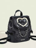 Mini black PU leather backpack bag with Heart Decor Chain detail, lace-trimmed heart applique, bow accents, and silver chain