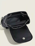 Mini black PU leather backpack bag with silver Heart Decor Chain detail and open flap showing interior