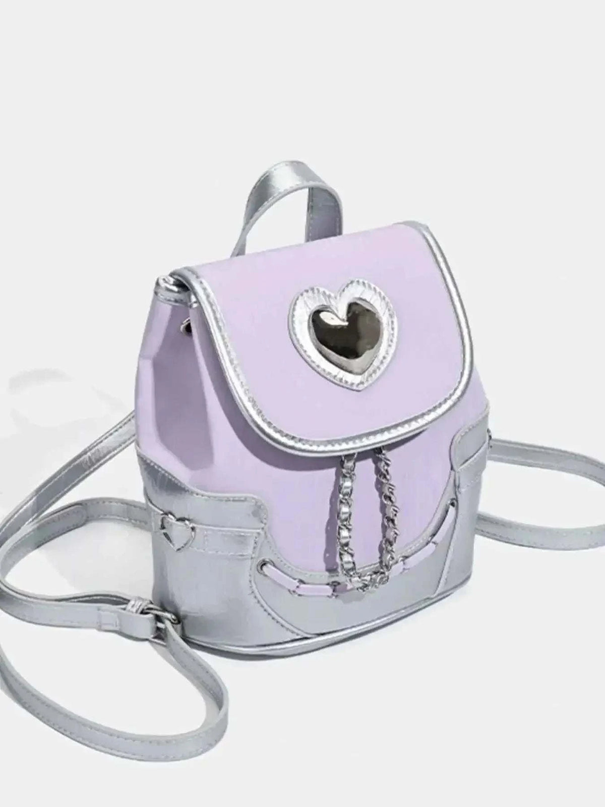 Heart Flap Backpack in pastel purple and silver PU leather featuring a heart-shaped window and chain detail on the flap