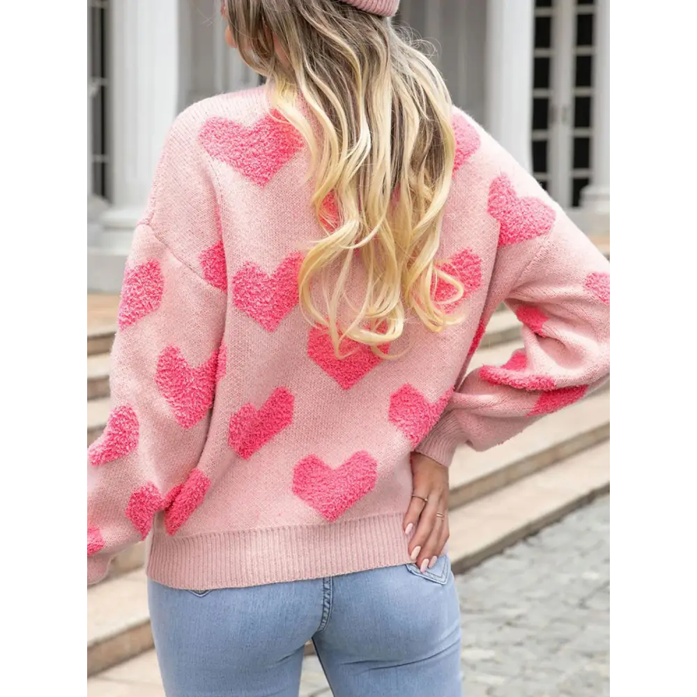 Elevate your look with the heart round neck dropped shoulder sweater $39.99 experience a classic allure with a basic