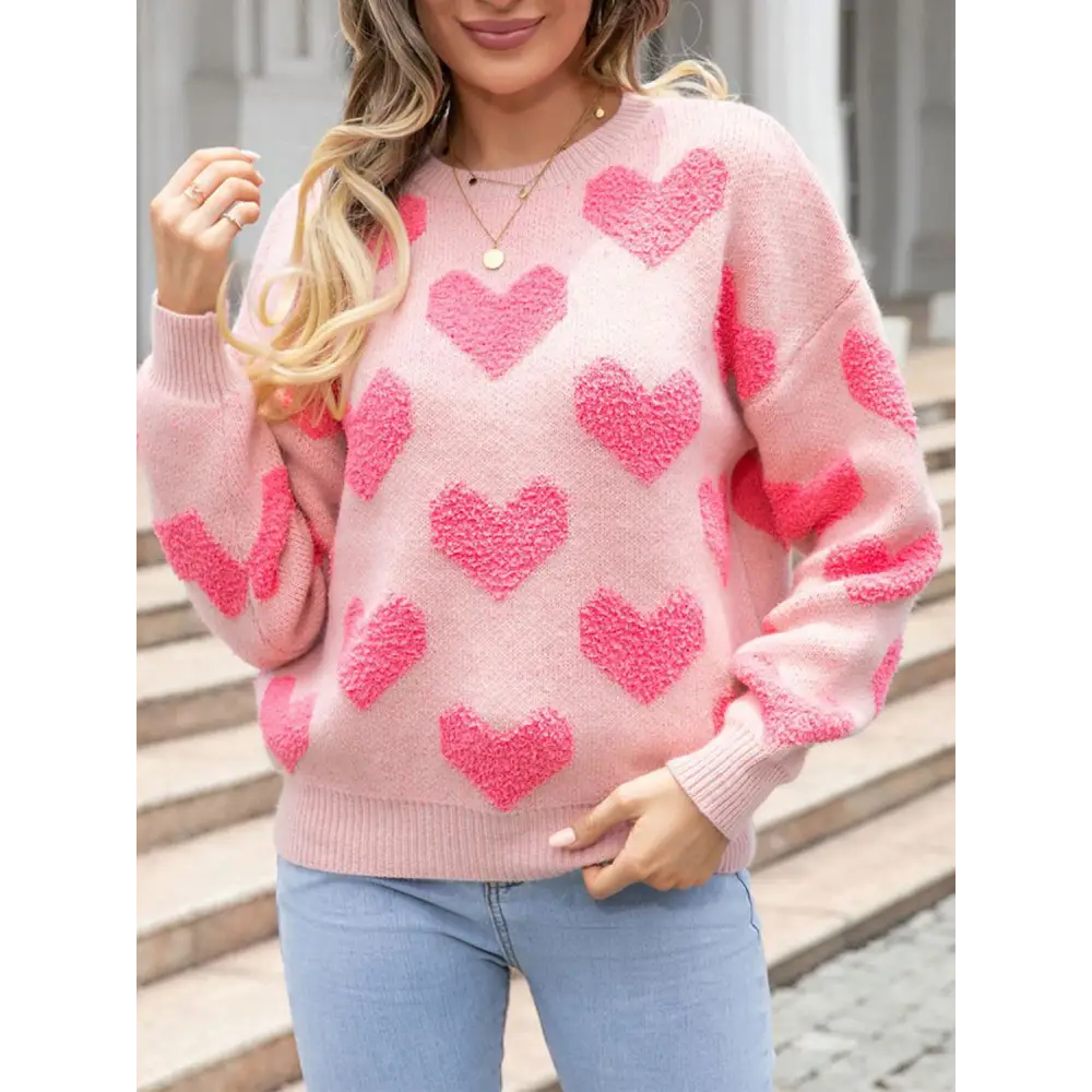 Elevate your look with the heart round neck dropped shoulder sweater $39.99 experience a classic allure with a basic