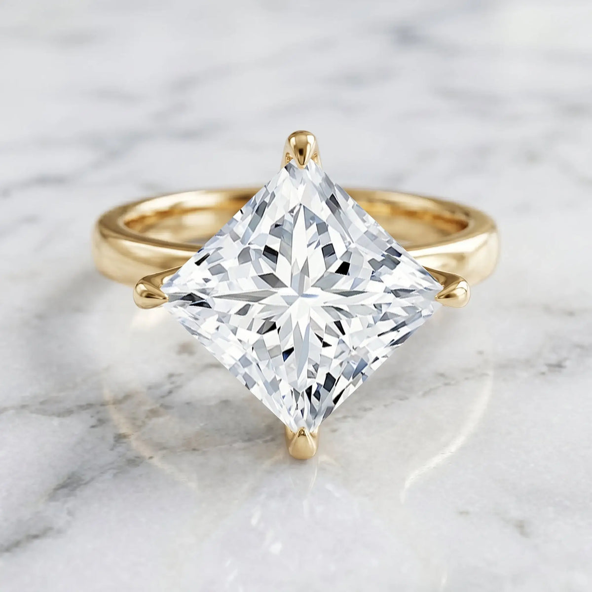 IGI Certified Diamond 4 carat princess cut lab grown diamond ring with yellow gold claw setting and brilliant sparkle