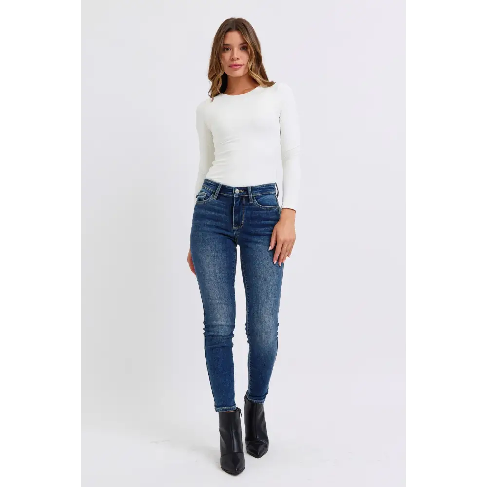 Elevate your wardrobe with judy blue luxury fashion skinny jeans $65.99 mid-rise waist skinny jeans with pockets