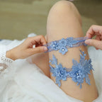 blue lace floral garter belt set with crystal pearl embellishments worn on thigh featuring Sexy Lace Flower detail