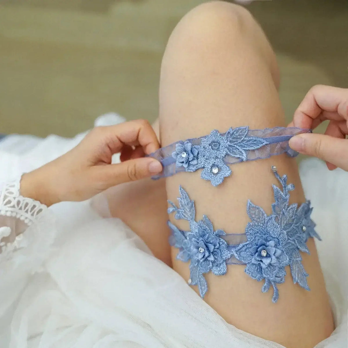 blue lace floral garter belt set with crystal pearl embellishments worn on thigh featuring Sexy Lace Flower detail