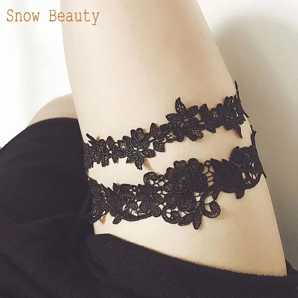 Sexy Lace Flower black lace floral garter belts with delicate patterns on a woman's thigh, elegant and stylish bridal accessory