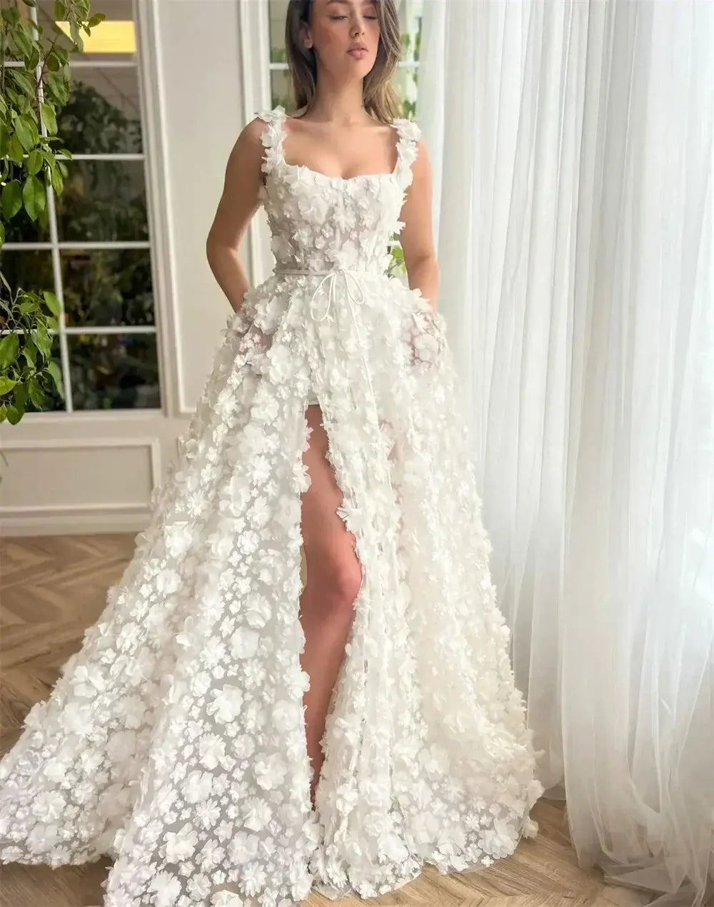 Kyoto Beige Wedding Dress featuring 3D floral appliques, sleeveless design, square neckline, and front slit on beige fabric