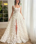 Kyoto Beige Wedding Dress featuring a floor-length silk satin A-line design with 3D floral appliques and a front slit