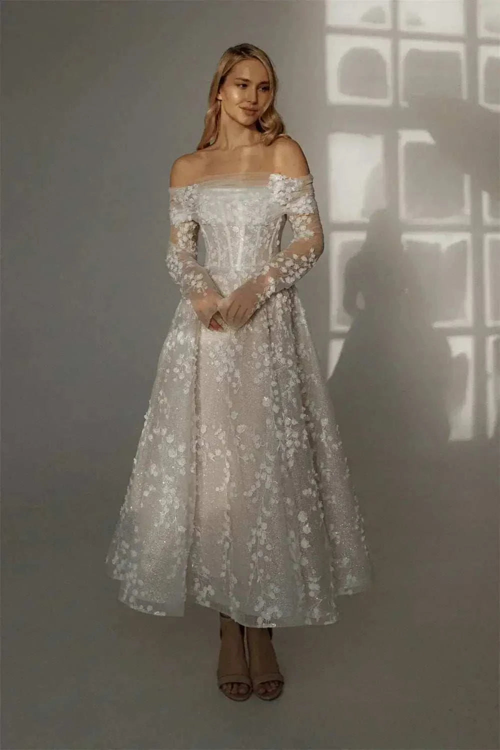 Kyoto Customized Lace off-shoulder wedding dress with floral lace pattern, long sleeves, and ankle-length skirt