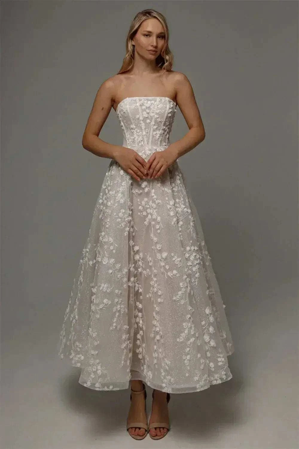 Kyoto Customized Lace strapless white wedding dress with floral lace appliques and an ankle-length A-line silhouette