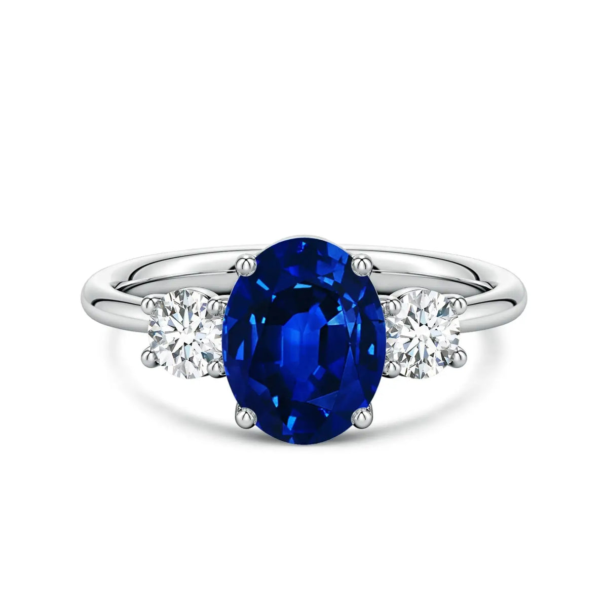Lab-Grown Blue Sapphire oval center stone engagement ring with two round diamonds set in polished 14K white gold