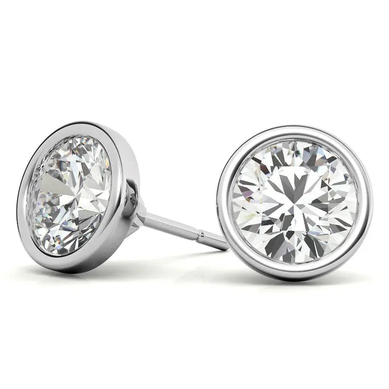 Lab grown diamond bezel stud earrings with round brilliant brilliant cut stones in 14K white gold, modern sleek design