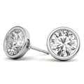Lab grown diamond bezel stud earrings with round brilliant brilliant cut stones in 14K white gold, modern sleek design