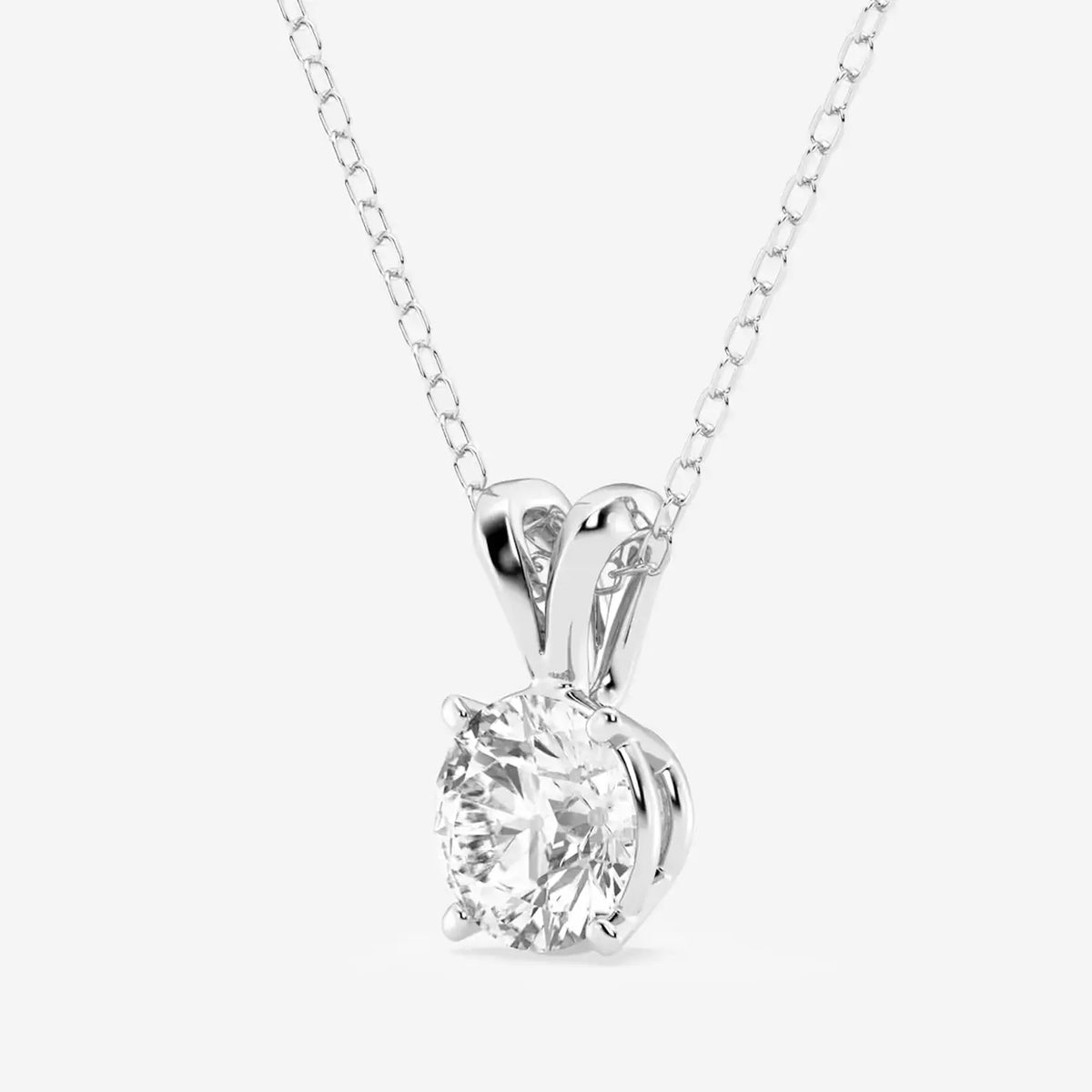 Lab Grown Diamond Pendant featuring a 0.75 CTW round brilliant diamond in a 14K white gold over sterling split bail setting with an 18-inch cable chain