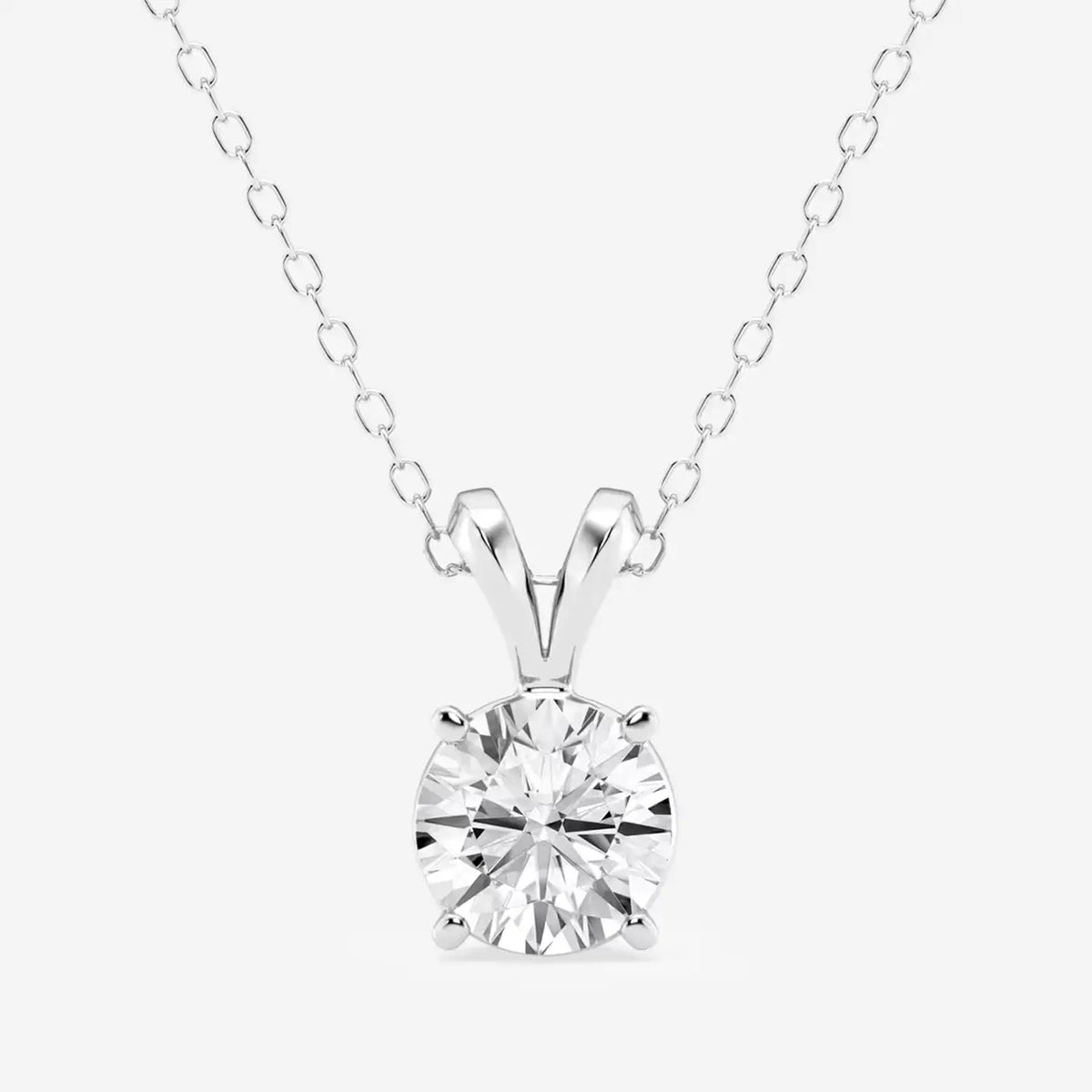 Lab Grown Diamond Pendant featuring a 0.75 carat round brilliant diamond set in 14K white gold over sterling silver with a split bail design and cable chain