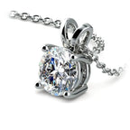 lab grown diamond pendant featuring a round brilliant cut diamond set in polished white gold with a delicate chain