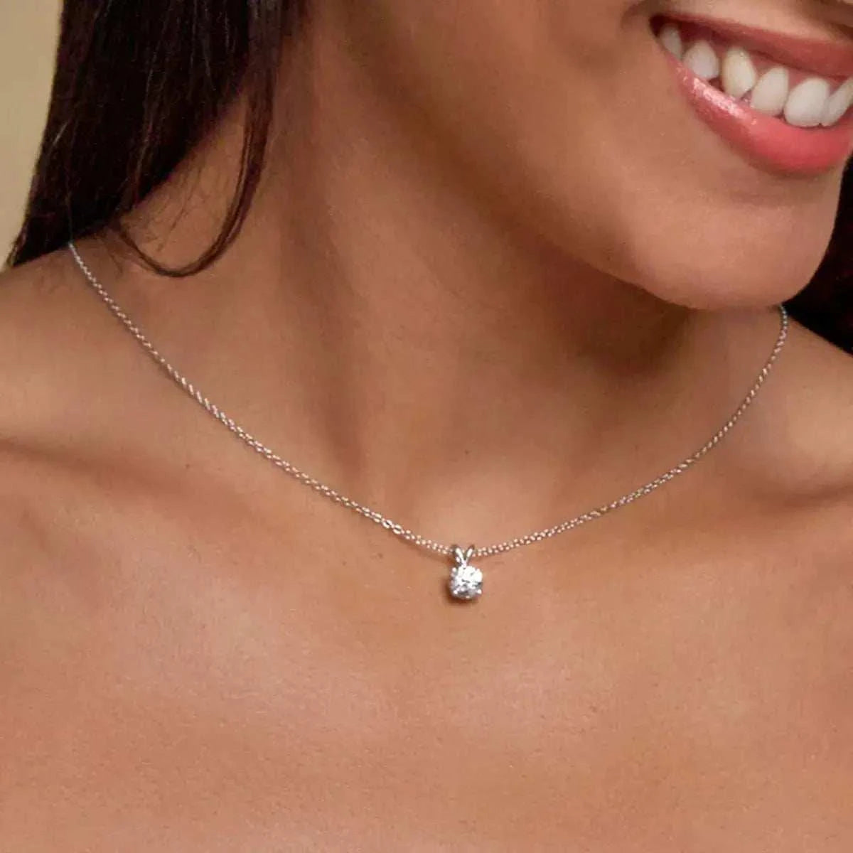 Lab Grown Diamond Pendant featuring a sparkling round solitaire diamond set in a white gold split bail design on a delicate cable chain