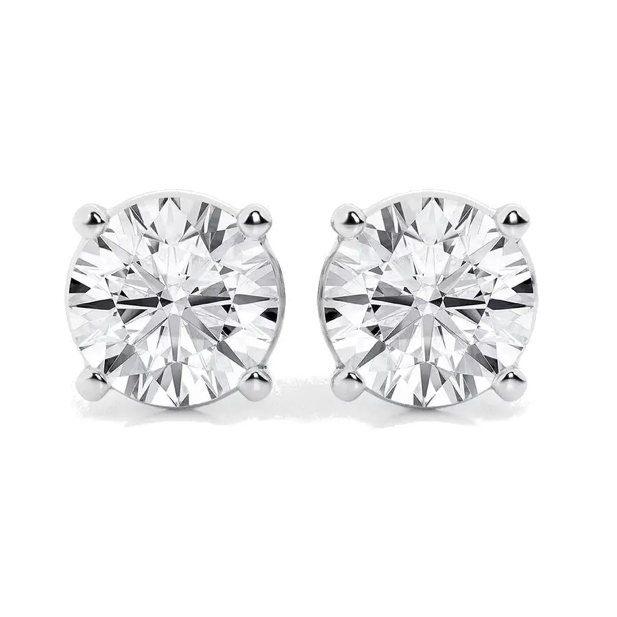 Lab Grown Diamond stud earrings featuring round brilliant cut clear stones set in 14k white gold over sterling silver with four-prong settings