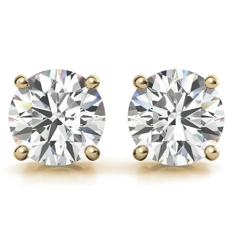Lab Grown Diamond round brilliant cut stud earrings with G-color, VS-clarity stones set in 14k gold over sterling silver