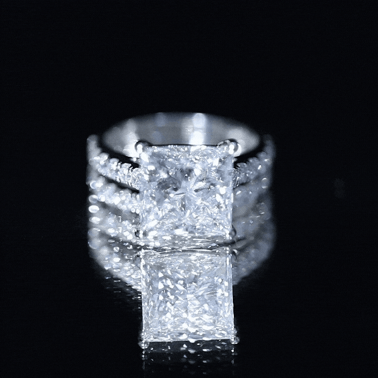 Lab Grown Diamond solitaire wedding ring set with a 5 carat princess cut center stone and round side stones in prong setting
