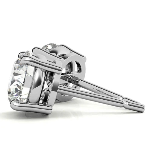 Lab-Grown Diamond Stud Earrings featuring round, clear stones set in sterling silver with 14k gold overlay and secure push-back closures