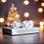 Lab-grown diamond stud earrings in 14K white gold with round brilliant cut, sparkling clear stones set in four-prong style