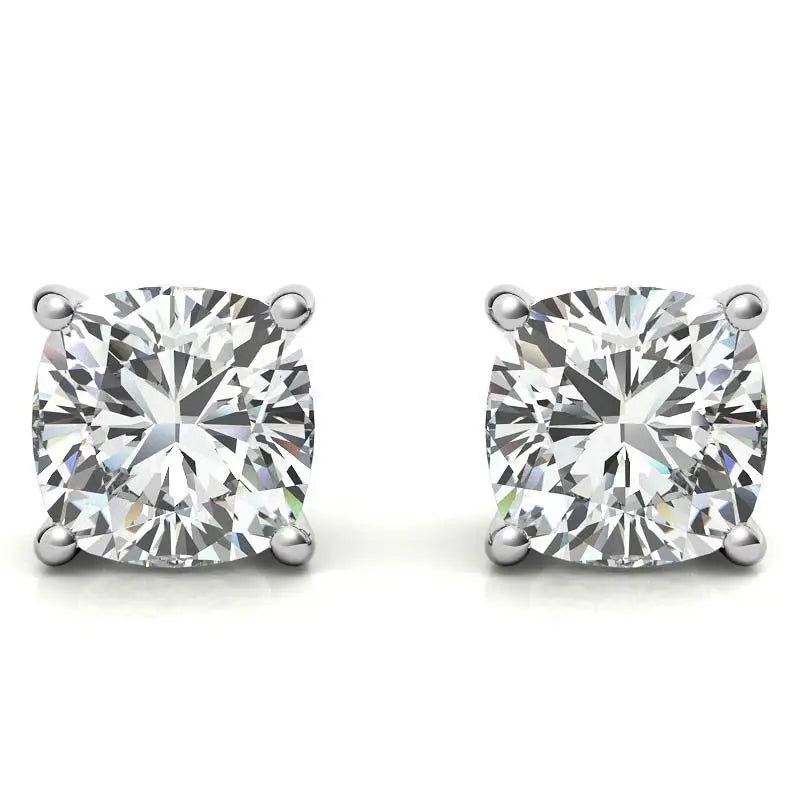 Lab-Grown Diamond Stud Earrings featuring two round brilliant cut clear diamonds set in 14k white gold over sterling silver prong mountings