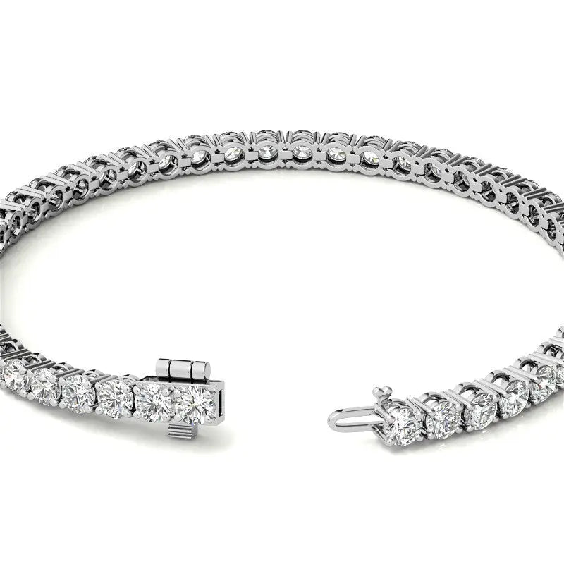 Lab Grown Diamond tennis bracelet with round brilliant clear stones set in 14K white gold featuring a secure box clasp