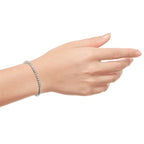 Lab Grown Diamond tennis bracelet featuring round brilliant diamonds set in 14k white gold on wrist