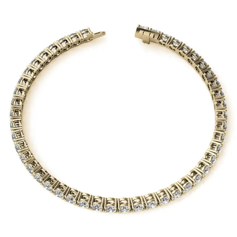 Lab Grown Diamond tennis bracelet with round brilliant stones set in 14K yellow gold featuring a box clasp and safety latch