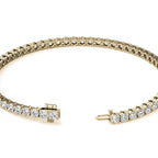 Lab Grown Diamond tennis bracelet with round brilliant stones set in 14kt yellow gold featuring secure clasp
