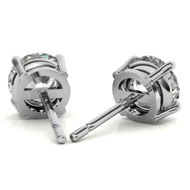Lab Grown Diamond stud earrings with round brilliant cut clear stones set in 14k white gold over sterling silver with secure push-back closures