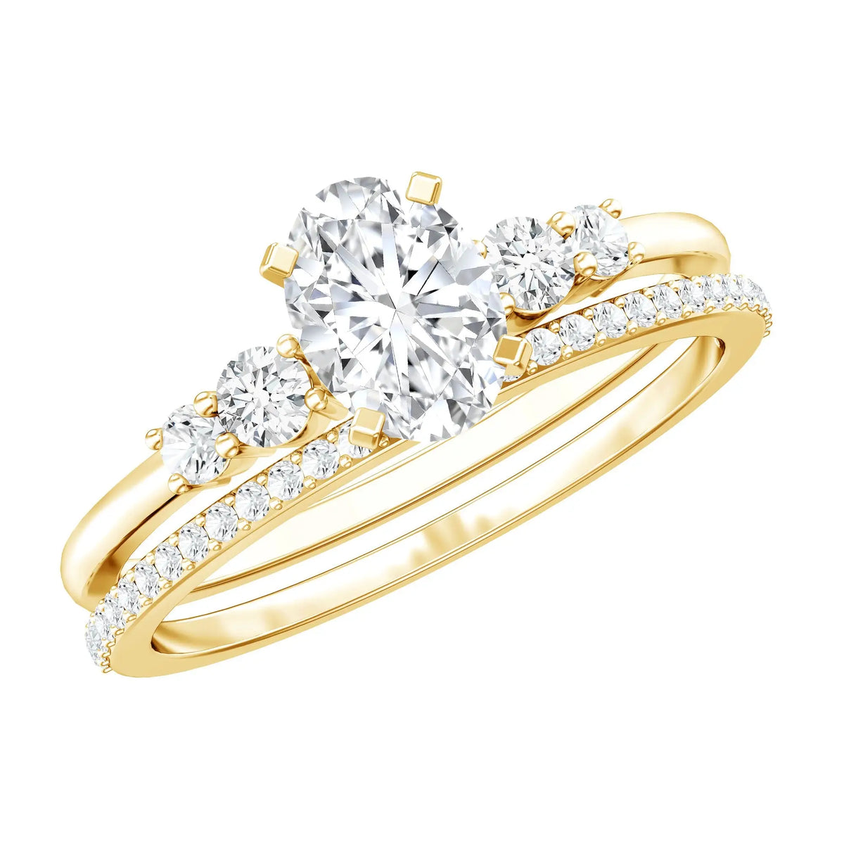 Lab Grown Diamond engagement ring set in yellow gold featuring an oval center stone with round side stones and matching diamond band