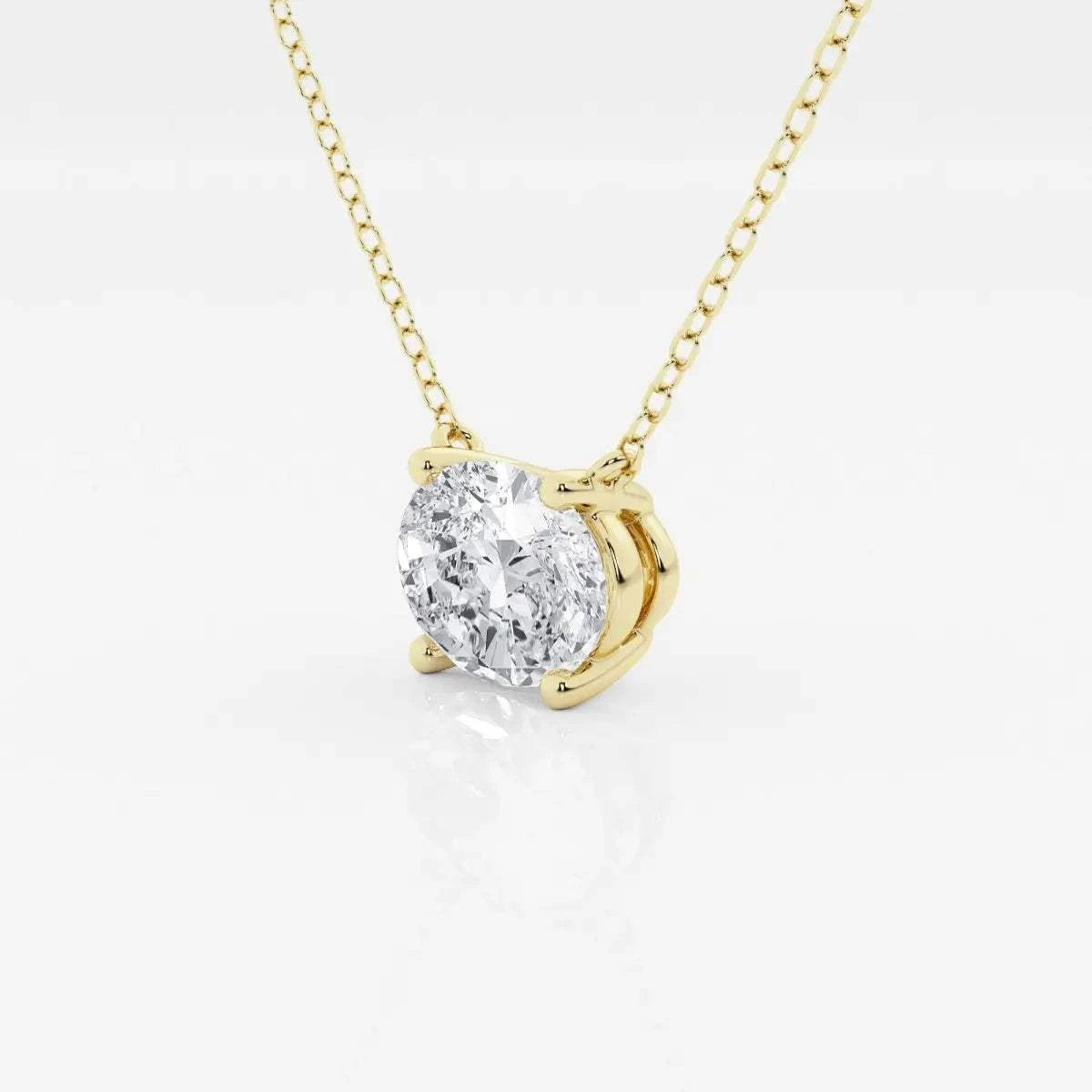 Lab Grown Diamond solitaire pendant with a round clear stone set in a classic 14K yellow gold chain necklace