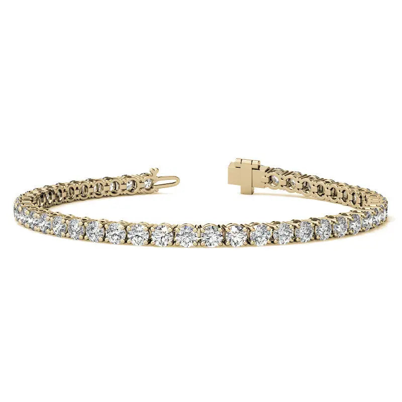Lab Grown Diamond tennis bracelet with 58 round brilliant stones set in 14K yellow gold featuring a secure box clasp