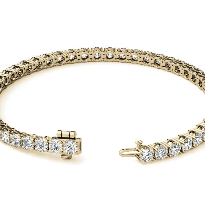 Lab Grown Diamond tennis bracelet in yellow gold featuring round brilliant stones with secure box clasp and safety latch