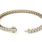 Lab Grown Diamond tennis bracelet in yellow gold featuring round brilliant stones with secure box clasp and safety latch
