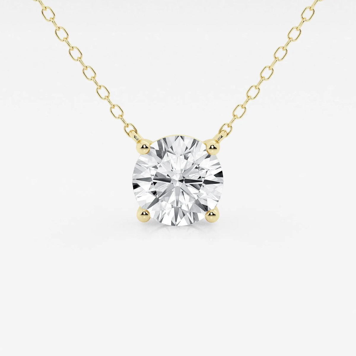 Lab Grown Round Diamond solitaire pendant with a 3 ct round brilliant diamond in a 14K yellow gold prong setting on a delicate cable chain