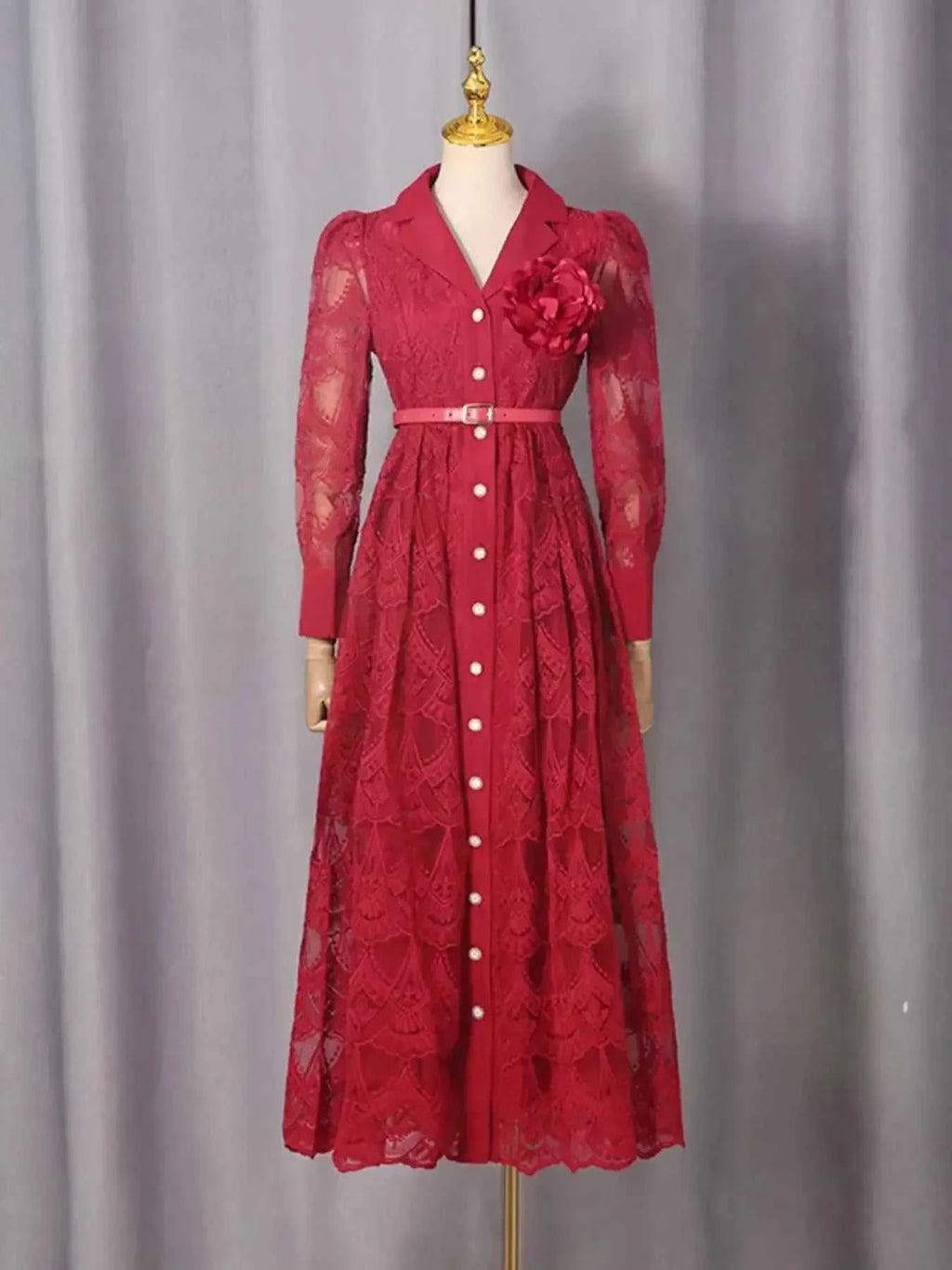Lace Button Front Midi Dress in deep red featuring intricate lace, full button front, long sleeves, and a matching belt with floral embellishment