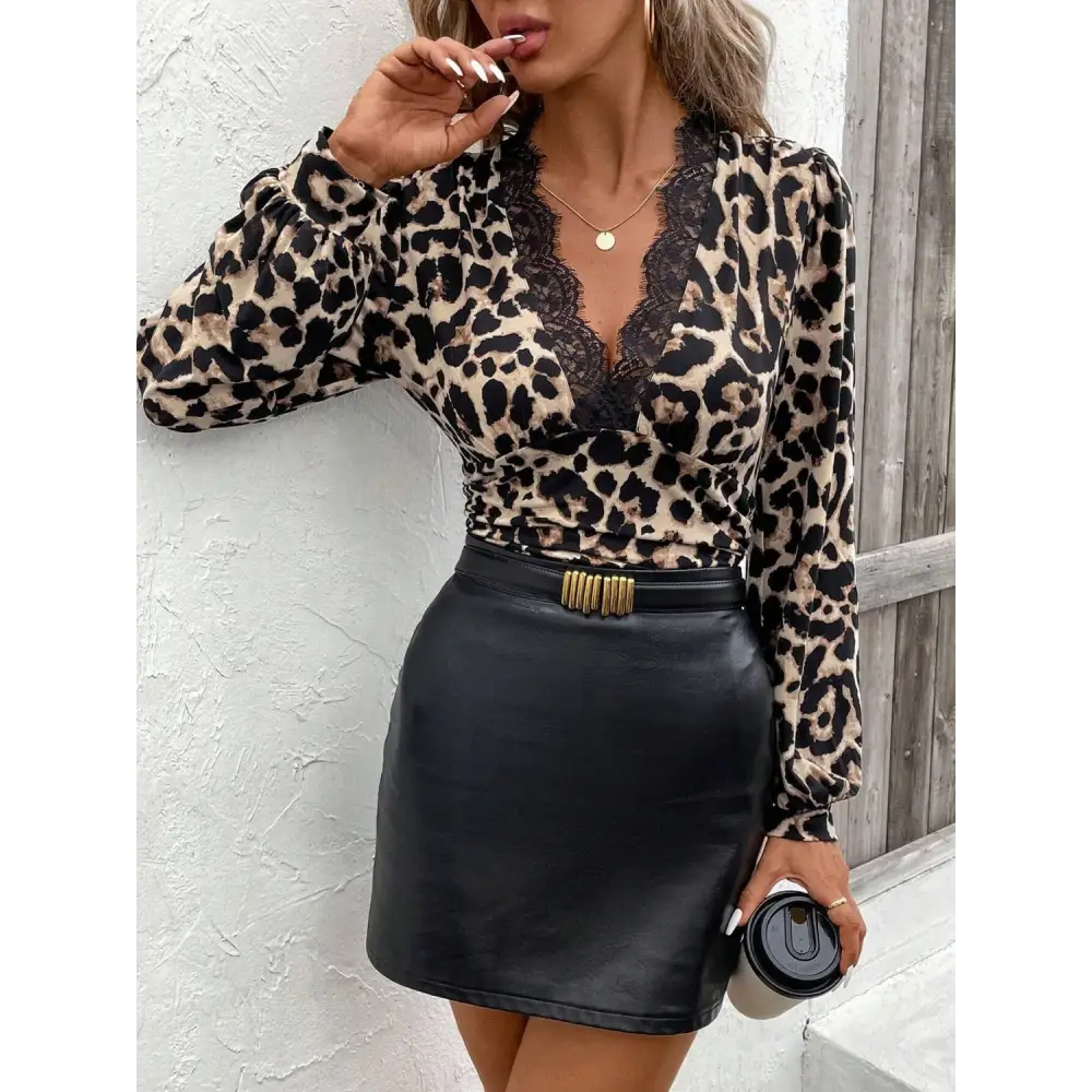 Lace detail leopard v-neck long sleeve top $26.99 lace detail semi-sheer slightly stretchy material 95% polyester, 5%