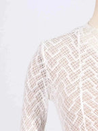 Lace Mock Neck white long sleeve dress detail with geometric patterned lace and high neckline