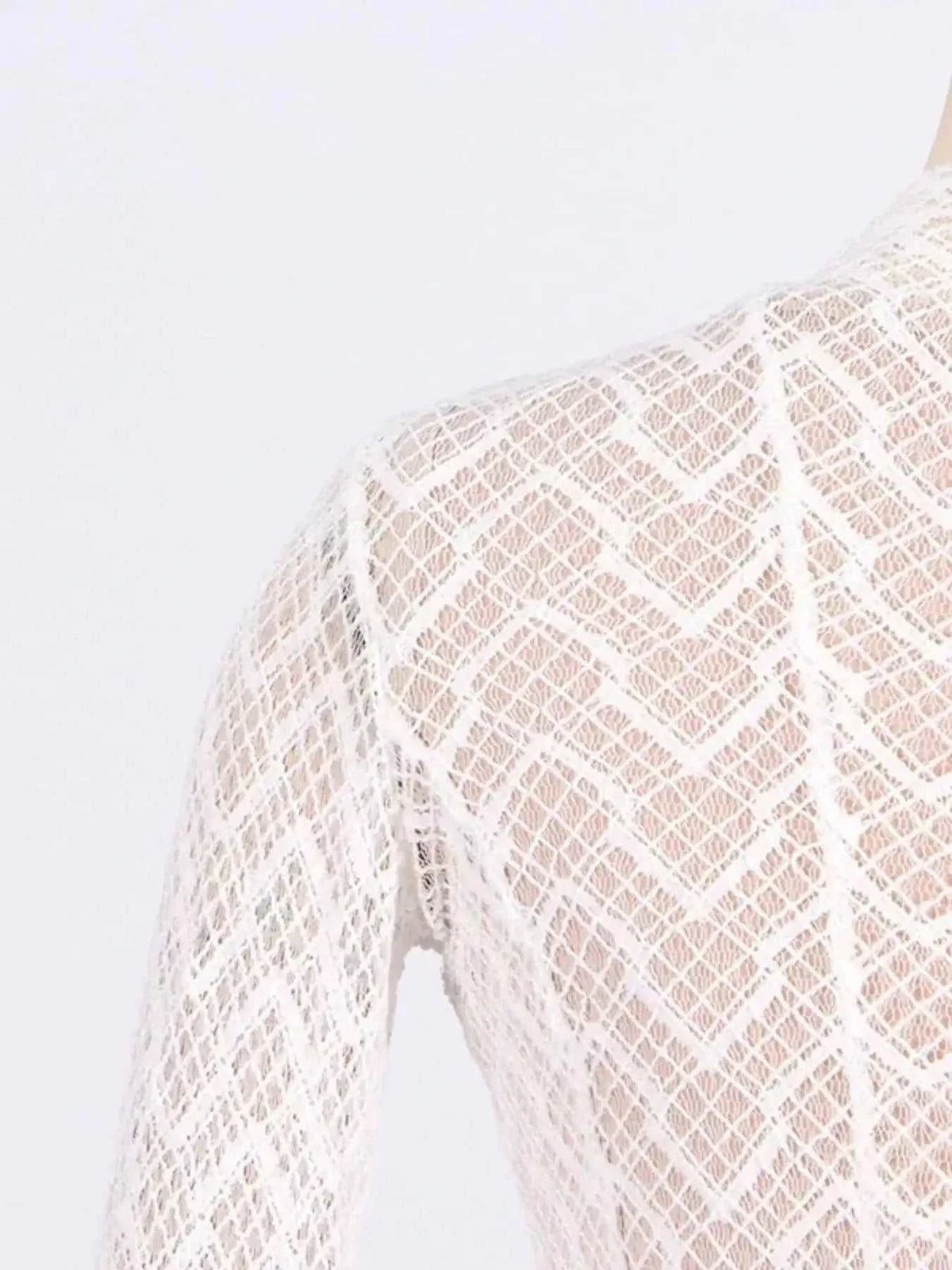 Lace Mock Neck long sleeve maxi dress featuring white geometric lace pattern with sheer body and lined fabric