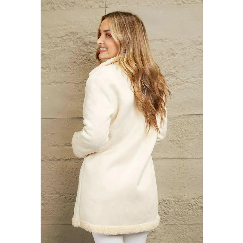 Experience ultimate comfort with the longline teddy coat in luxury fashion $54 pocketed, buttoned for ultimate utility