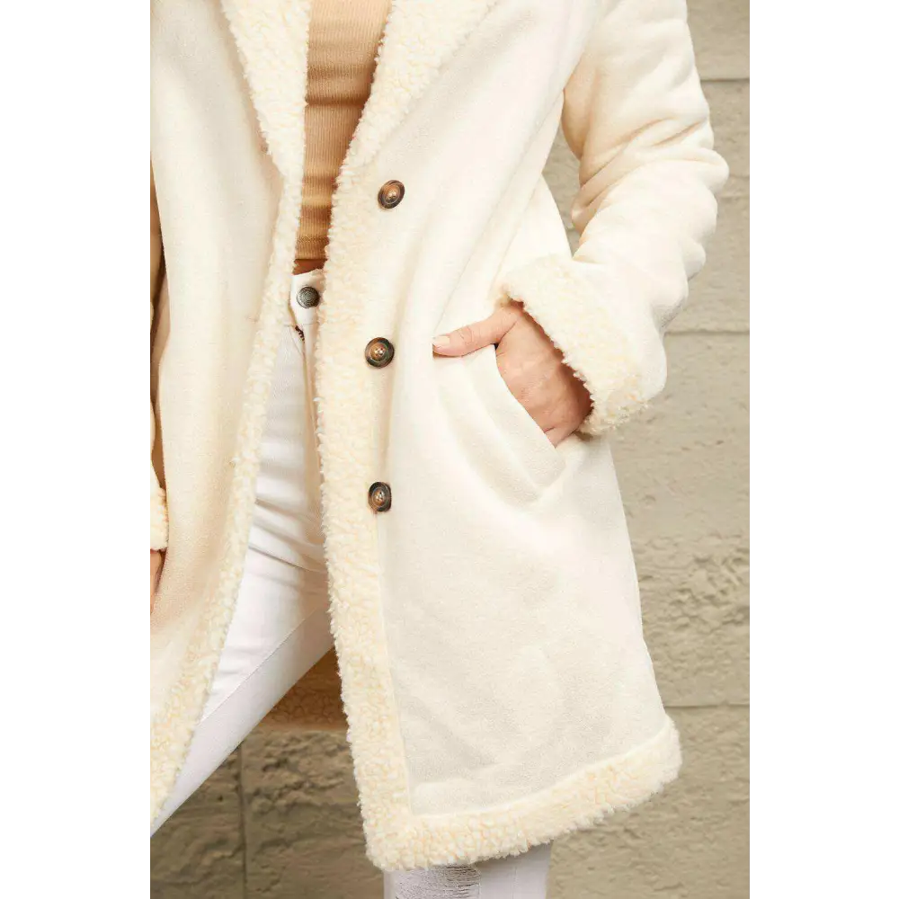 Experience ultimate comfort with the longline teddy coat in luxury fashion $54 pocketed, buttoned for ultimate utility