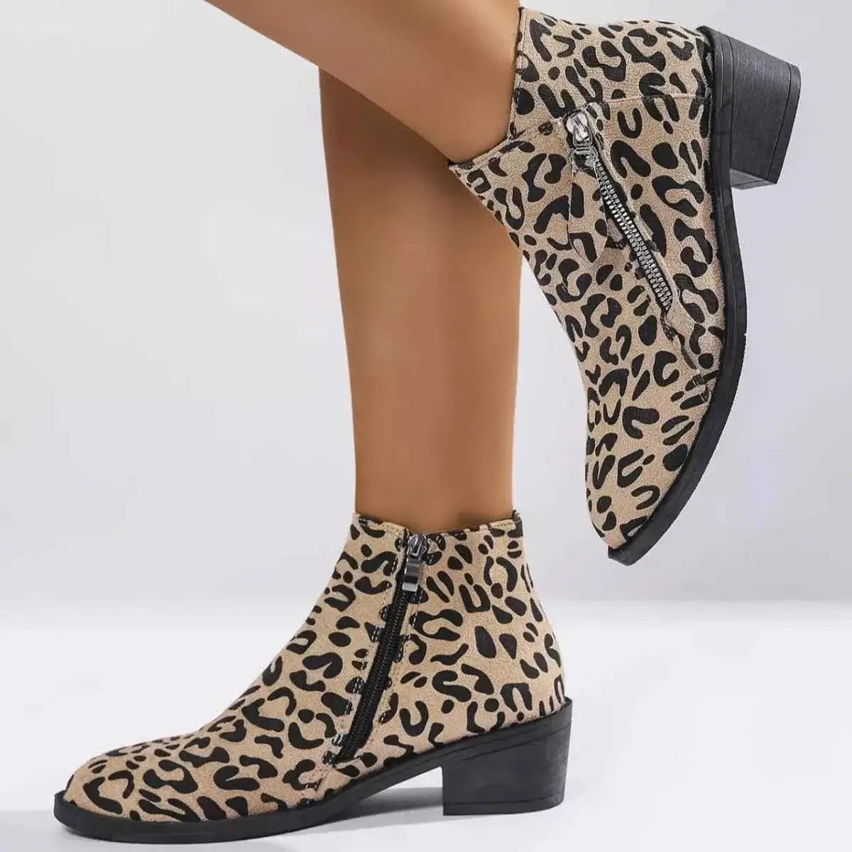 Leopard block heel ankle boots in beige and black suede with side zipper and mid-height block heel