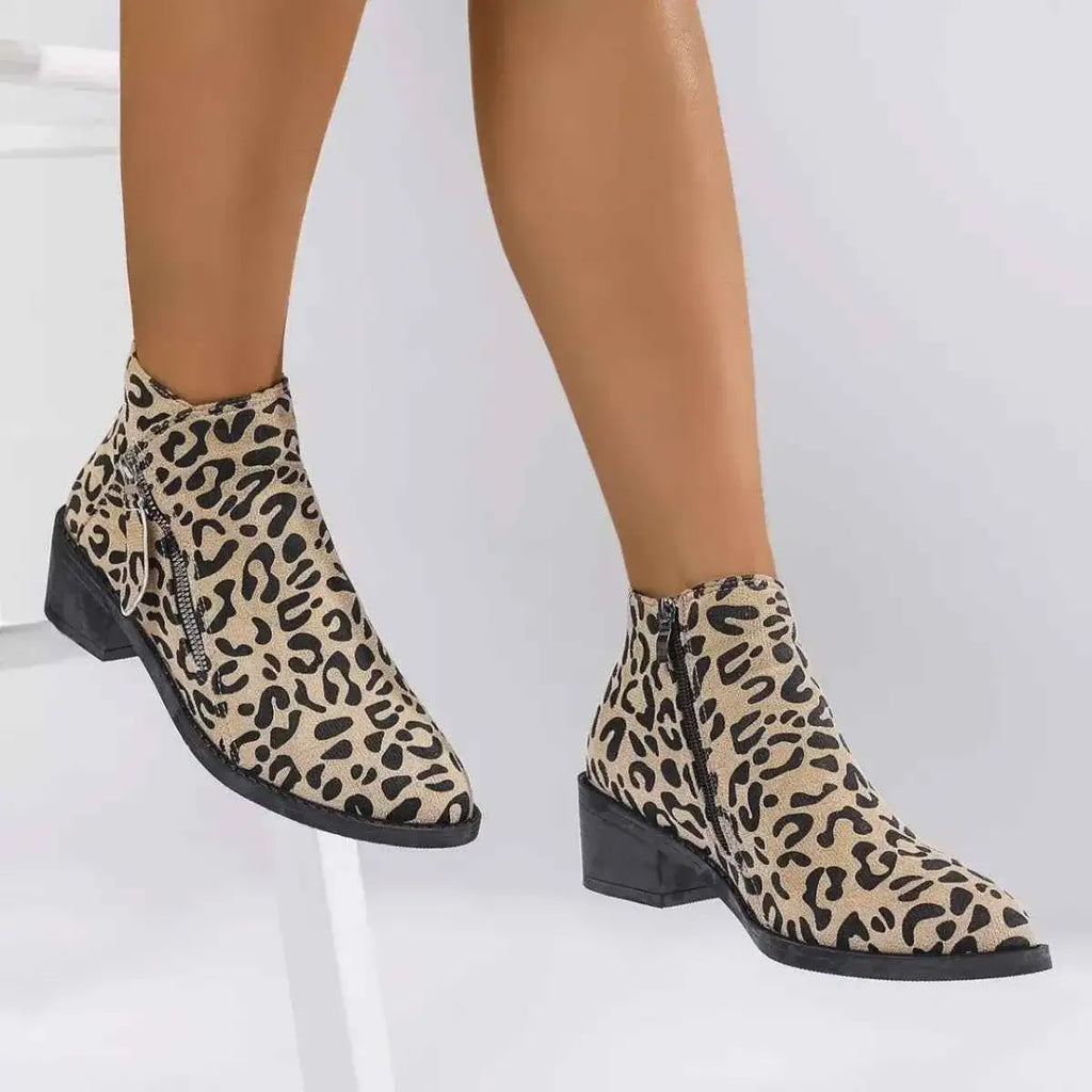 Leopard Block Heel ankle boots in beige and black suede with a leopard pattern, low block heels, and side zippers