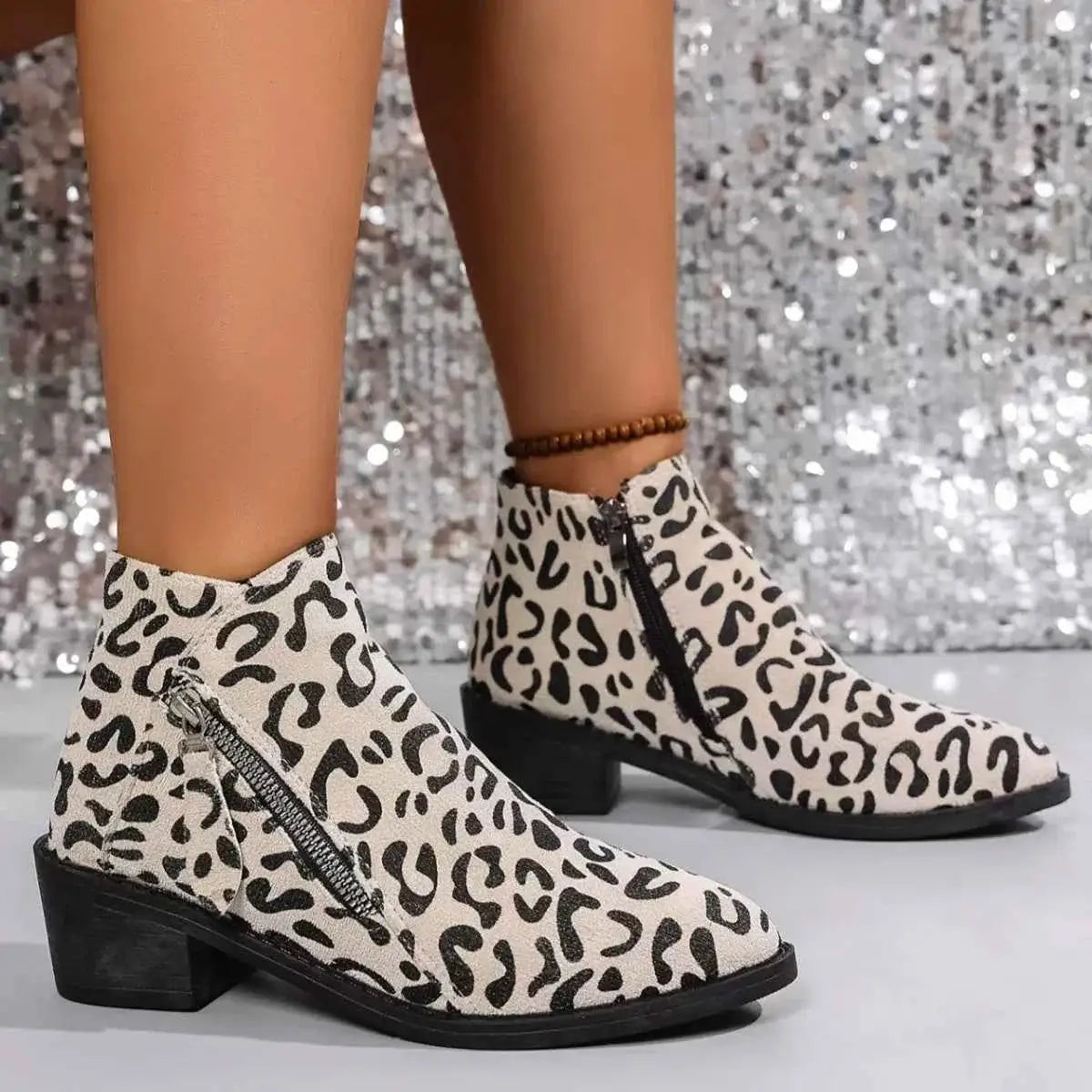 Leopard Block Heel ankle boots in white suede with black leopard print, side zipper, and mid block heel